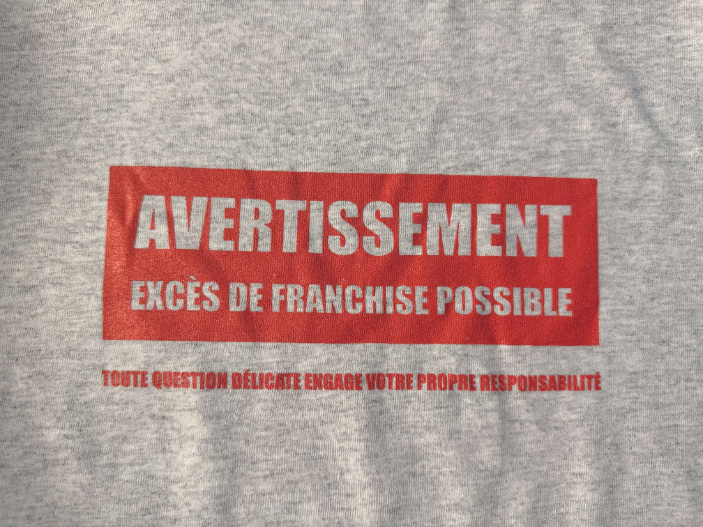 T-shirt Unisexe - Avertissement de franchise - Gris cendré