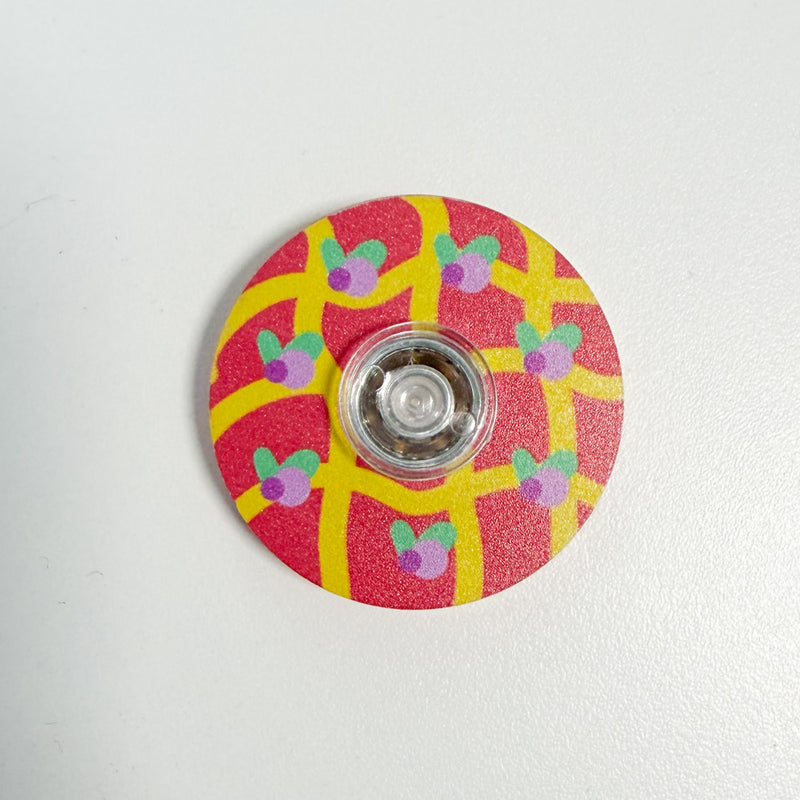 Toupie à doigts miniature à motifs